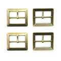 Set of 4 antique gold tone metal buckles on a white background.