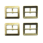 Set of 4 antique gold tone metal buckles on a white background.