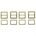 Antique gold tone metal buckles for shoes and bags on display.