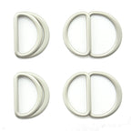 Four silver tone metal hinged D rings on a white background.