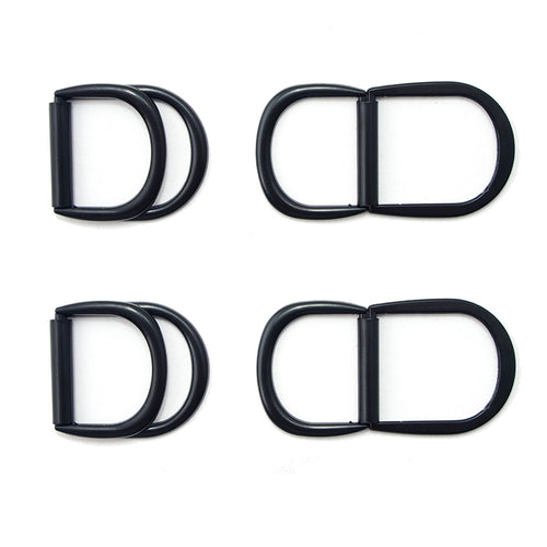 Set of 4 black metal hinged locking D rings for accessories.