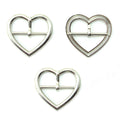 Three silver tone metal heart shaped buckles for accessories.