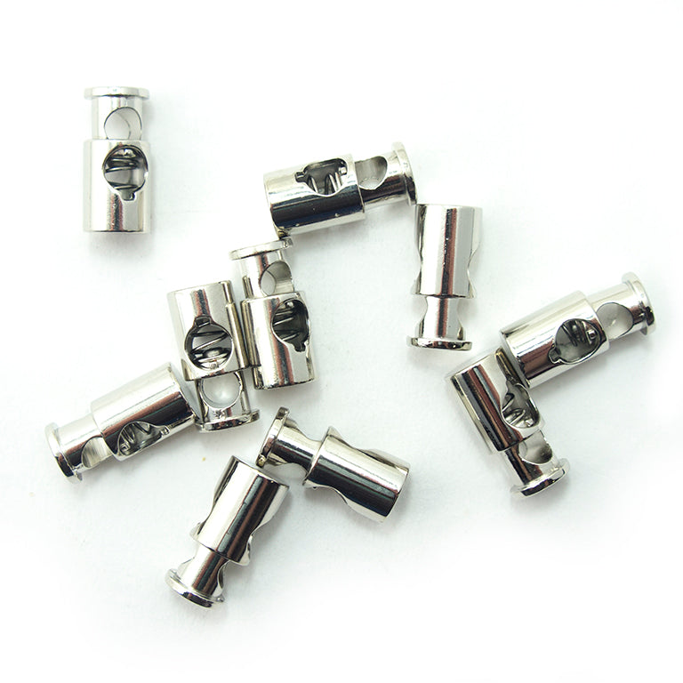 Set of 10 silver tone metal spring stop cord toggles on a white background.