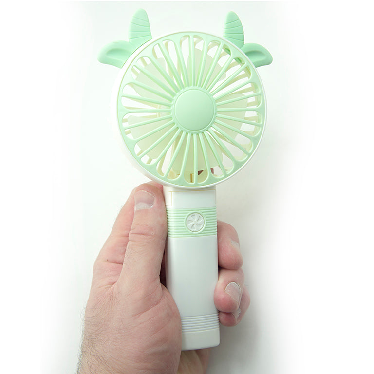 Close-up of the USB charging port on the handheld fan.