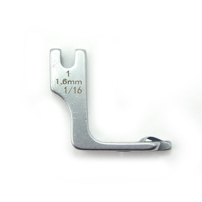 Industrial sewing machine hemming foot showing side view