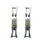 Polished gunmetal tone equestrian buckle on a white background.