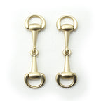 Matte gold tone metal hinged equestrian buckle on a white background.
