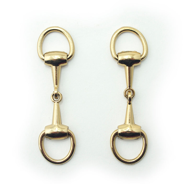 Darker gold tone metal hinged equestrian buckle on a white background.