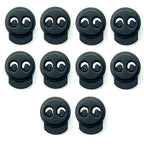 Set of 10 black metal hoodie cord locks displayed