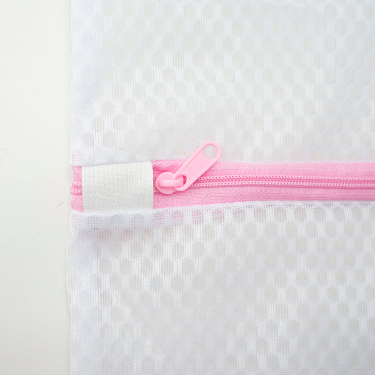 Close-up of a laundry bag showing the small net holes for protection.