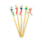 Five bamboo ear wax removers with decorative figures, 12 cm long.