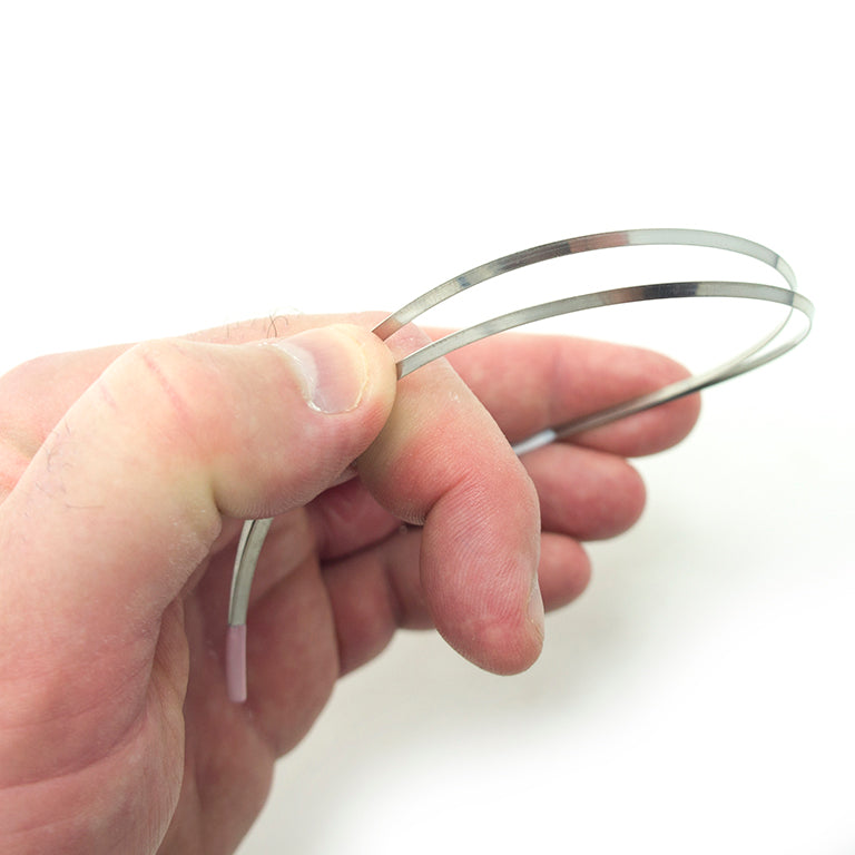 Close-up of the flexible 2 ply metal bra wires showing their bendable feature.