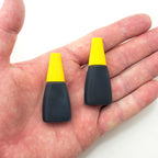 Close-up of 20 ml ink bottles for numbering machine use.