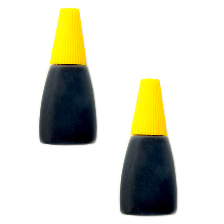 Two bottles of black ink for automatic numbering machine stamps.