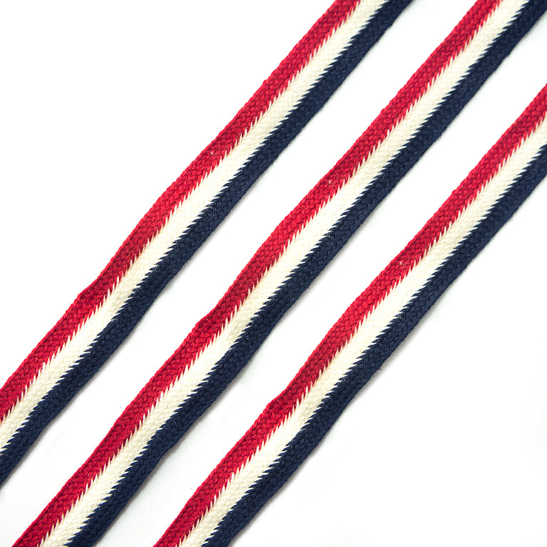 Red cream and navy cotton flat rope on a white background.