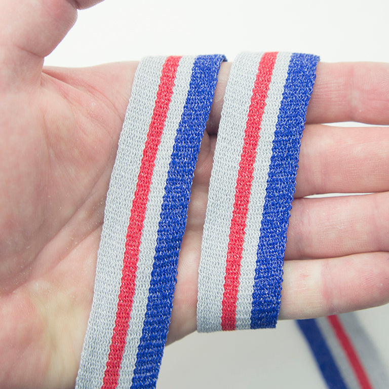 Flat rope displayed in a roll, highlighting its 25 mm width