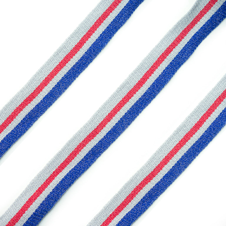 Red, blue, and grey flat rope trim on a white background