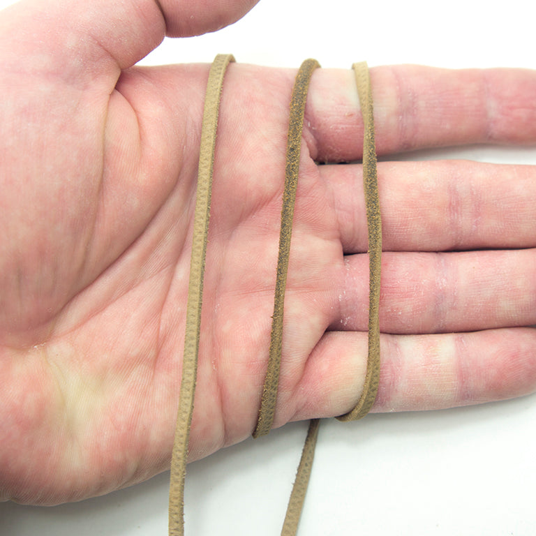 Close-up of the 3 mm wide suede cord showing its soft texture.