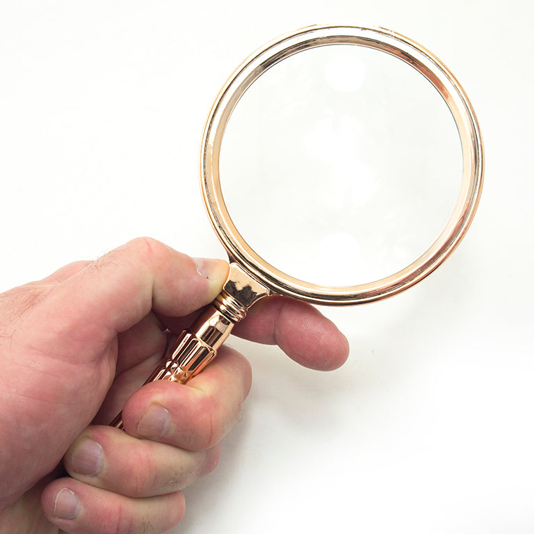 Side view of the magnifying glass showcasing the acrylic handle.