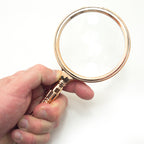 Side view of the magnifying glass showcasing the acrylic handle.