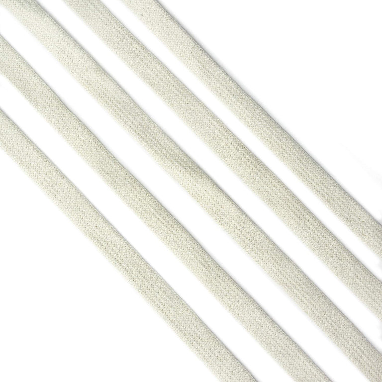 Flat cream cotton rope cord trim on a white background.