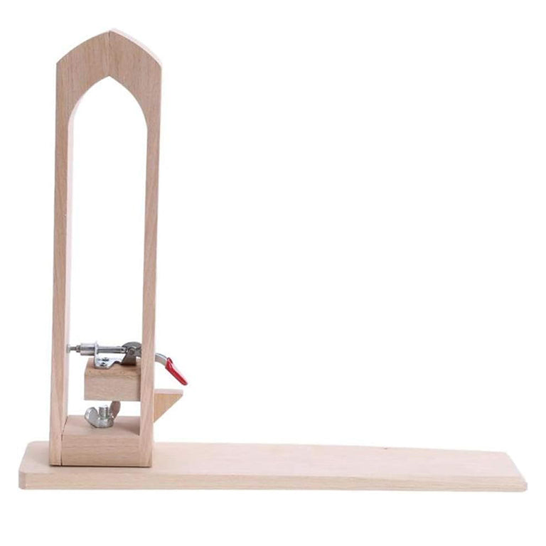 Beech wood stitching pony clip alongside sewing tools