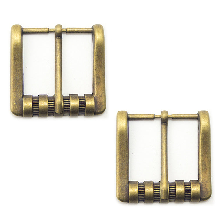 Two large square antique brass tone buckles for belts and bags.