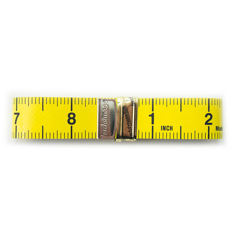 Close-up of clear numbers on Hoechstmass tailors tape measure.