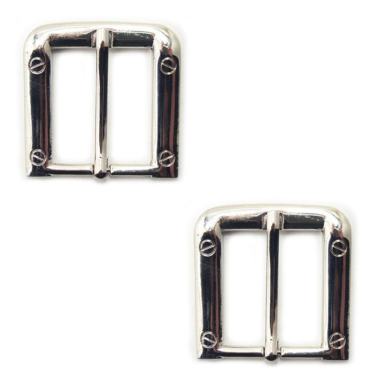 Two large square silver tone buckles for belts and bags.