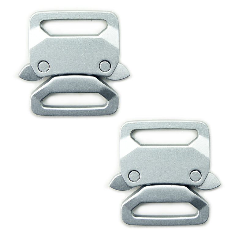 Two brushed silver tone metal strap buckles on a white background.