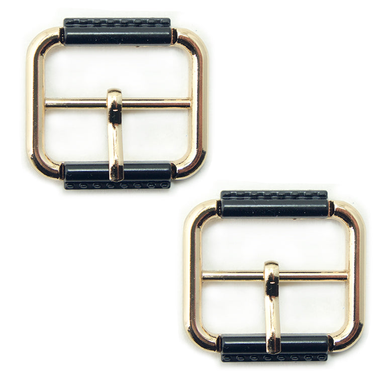 Two gold and black metal buckles for bags and belts