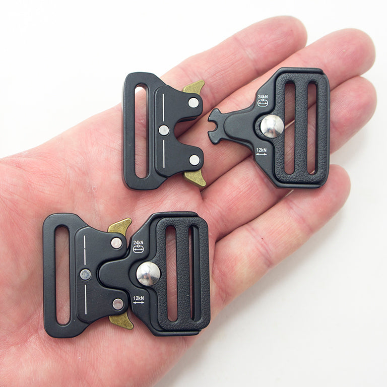 Close-up of a heavy duty quick release buckle showing its robust design.