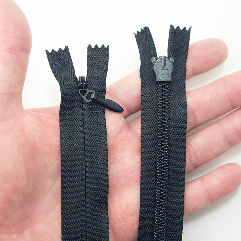 Close-up of a black invisible zip showcasing its nylon material.