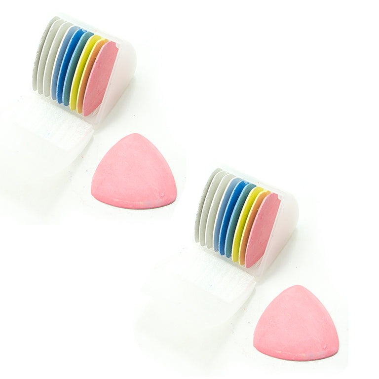 Close-up of multicoloured triangular tailor's chalks for sewing.