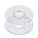 Close-up of a clear plastic bobbin suitable for domestic sewing machines.