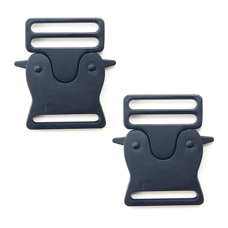Two matte black metal quick release buckles on a white background.