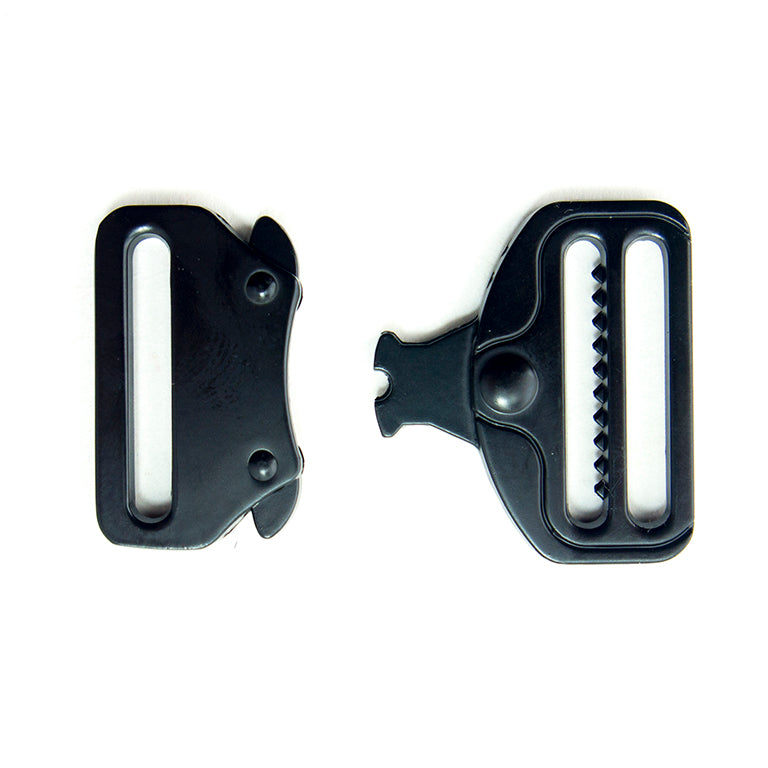 Set of two buckles displayed with a measuring tape for size reference.