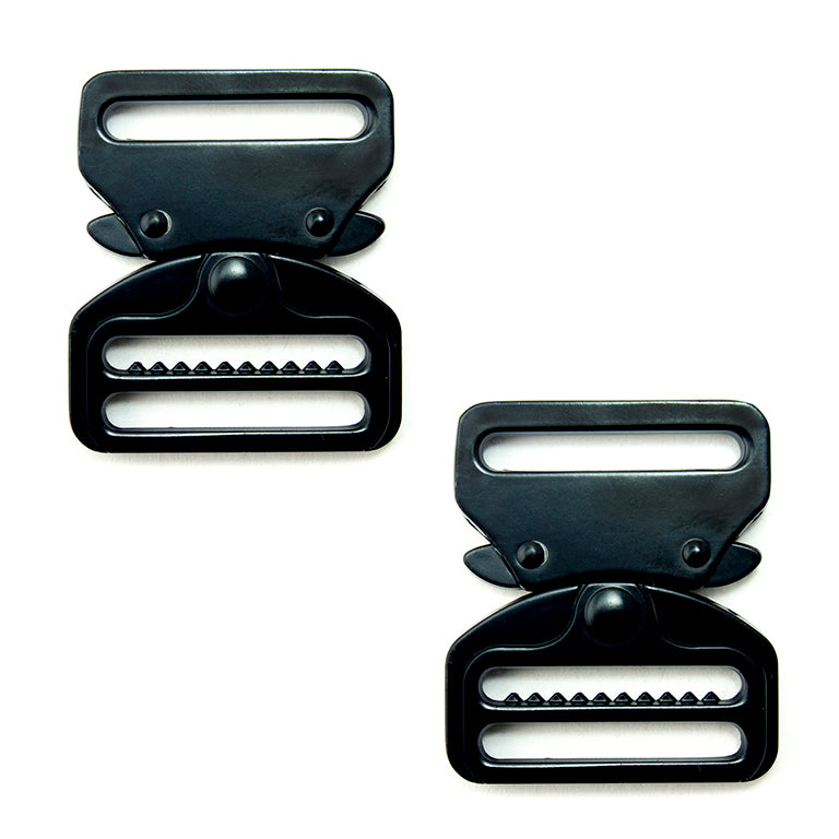 Two matte black metal quick release buckles on a white background.