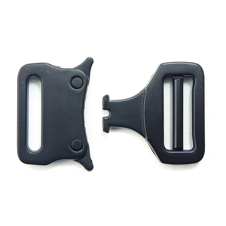 Close-up of brushed silver tone metal slider buckle for bags.