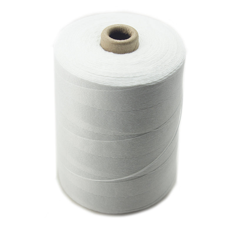Large spool of white eco friendly synthetic fibre thread.