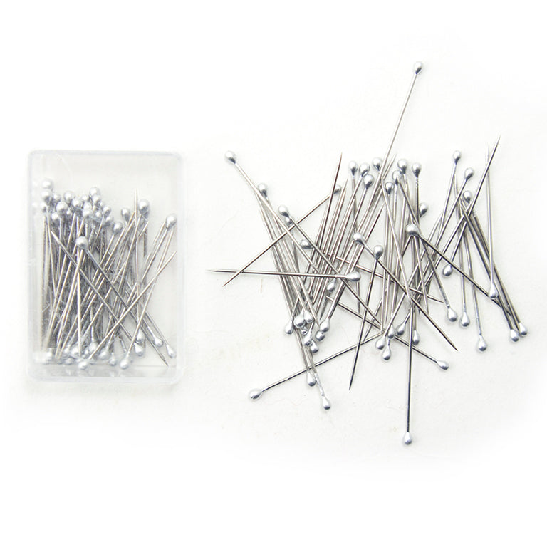Clear plastic box containing 100 small stainless steel tailors pins.