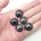 Buttons displayed in a neat arrangement, ideal for garment design.