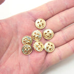 Buttons displayed on a fabric background for sewing projects.