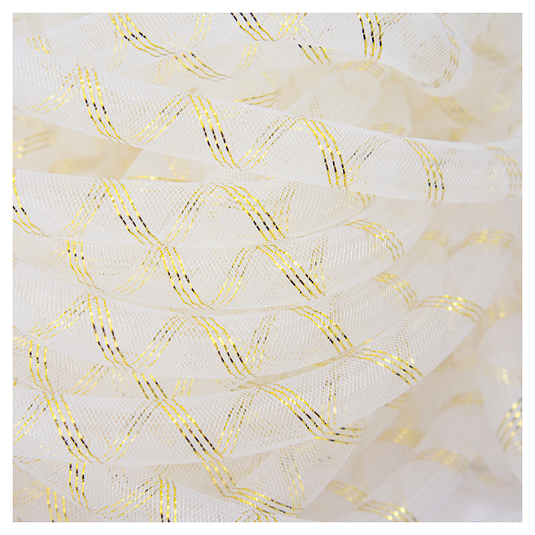 White tubular crin trim with gold trim on a spool