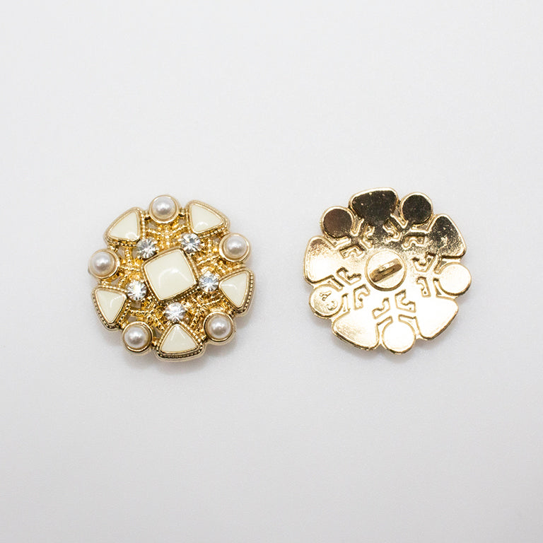 Buttons arranged neatly showing their gold tone setting