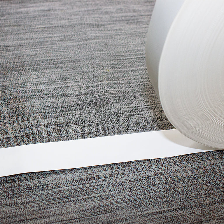 Close-up of the 25mm blank roll for printing garment labels.
