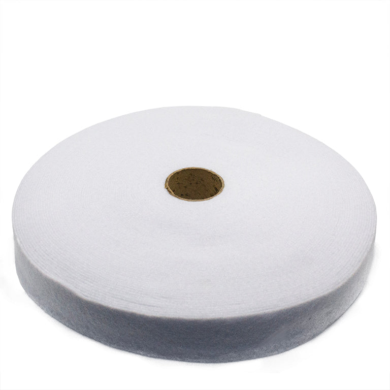 Roll of professional tailor's fibre foam fabric in white.