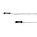 Close-up of HAHU cord ends on white cotton drawstrings.