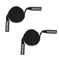 Two black cotton hoodie replacement drawstring cords with SUPREME ends.