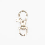 Lobster claw clasps attached to a keychain for practical use.
